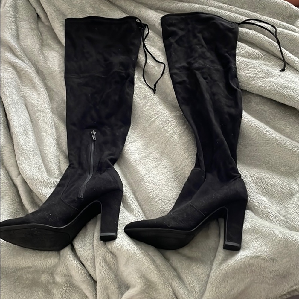 Thigh high black boots